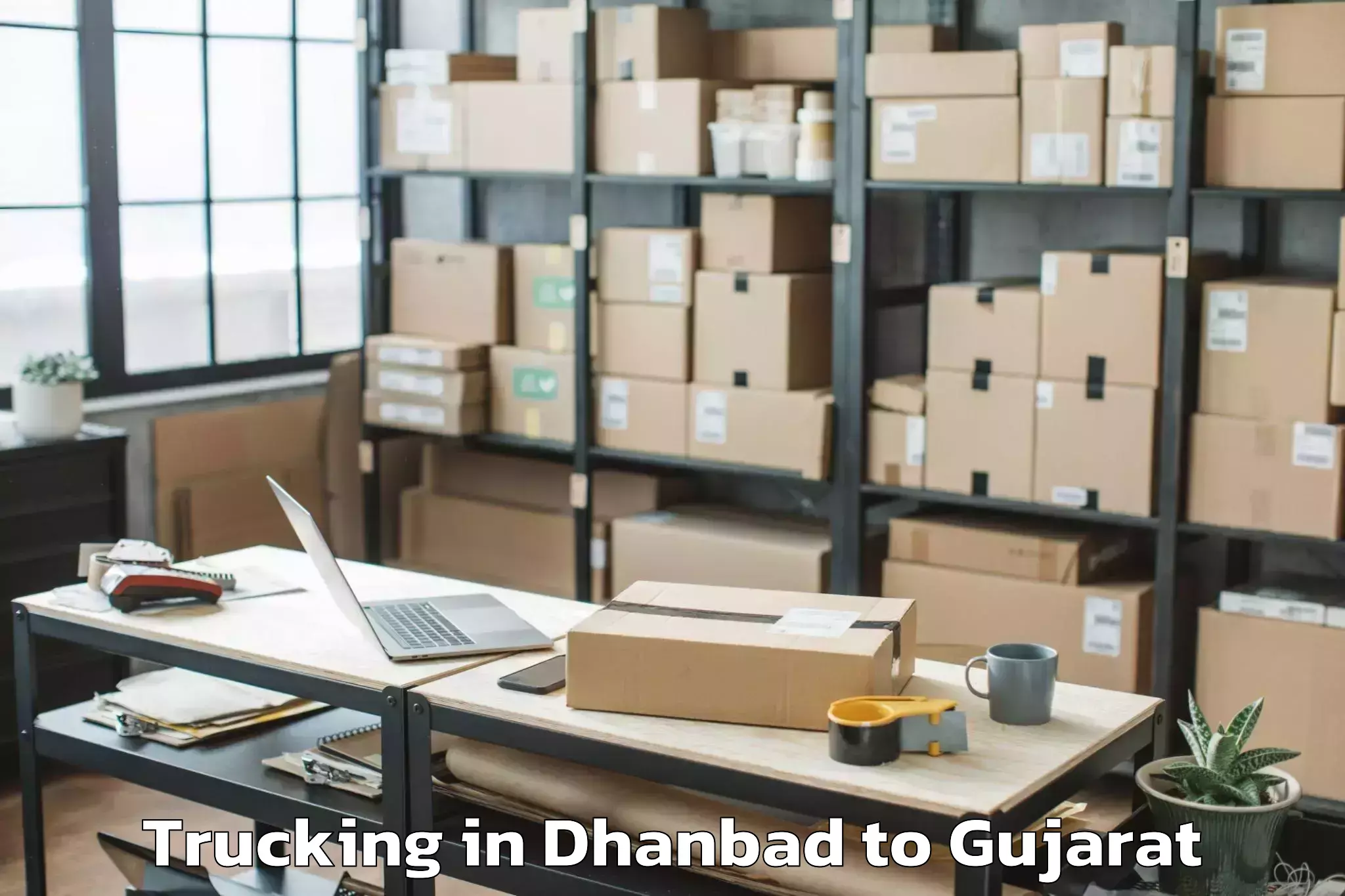 Hassle-Free Dhanbad to Bhanvad Trucking